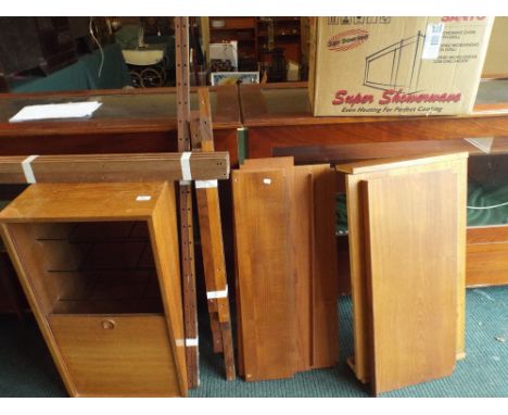 A Danish Teak Adjustable Wall Hanging Shelf and Cabinet Unit.
