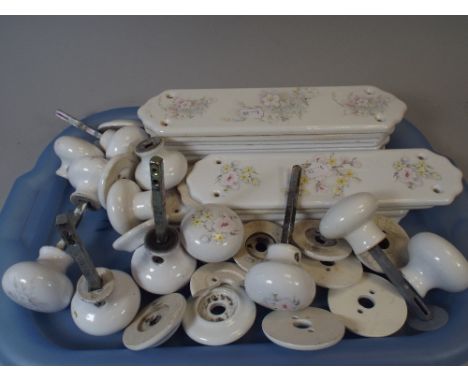 A Collection of Ceramic Door Finger Plates and Matching Door Knobs. 