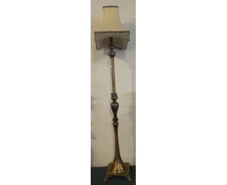 A Brass Standard Lamp and Shade 148 Cm High.