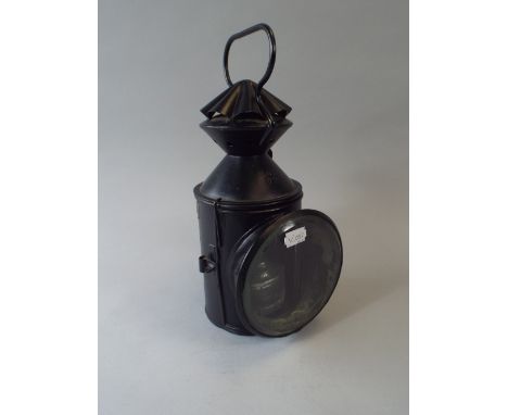 A London and North East Railway Guards Triple Aspect Railway Lamp with Red and Green Glasses.