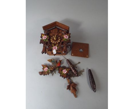 A German Cuckoo Clock in Need of Attention.