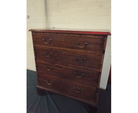A Georgian Style Mahogany Chest of Four Graduated Drawers and of Small Proportion on Bracket Feet. 