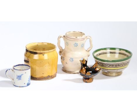 A collection of 19th Century and later French pottery, to include a vase with pale blue flowers, a mustard yellow jar, a bowl