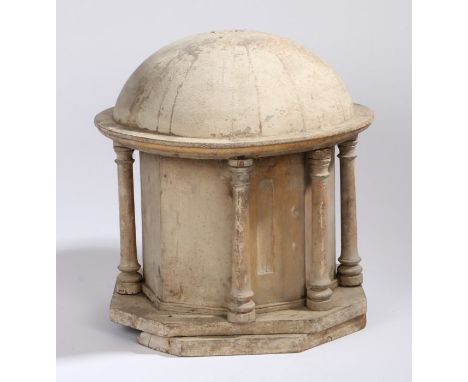 A 19th Century model of a domed building, possibly an architectural model, with a dome top above columns and an angled struct