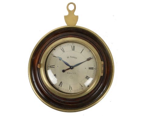 A 19th Century Sedan clock, W Frost, London, the silvered signed dial with black Roman hours and turned mahogany case mounted
