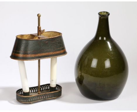 A 19th Century Toleware lamp, with a black and gold shade above two candle sockets and a shaped gallery, 21cm long, together 