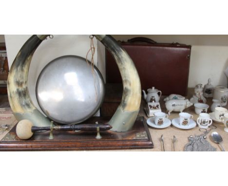 A horn gong together with a walnut mantle clock, Carlton china crested ware pig, other crested wares, cased and loose electro