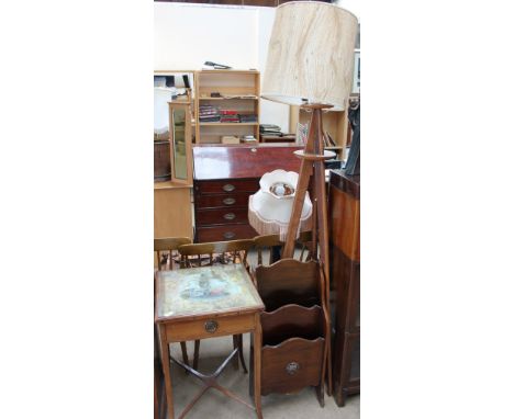 A teak tripod converted to a standard lamp, together with a magazine rack and an occasional table, the top applied with a sil