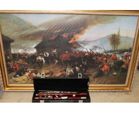A Lindo red lacquer flute, cased together a print of Rorke's Drift