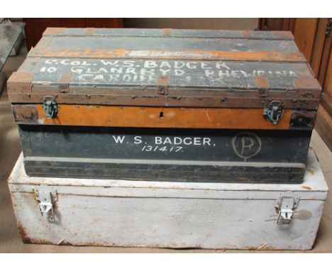A pine bound tool trunk together with a painted steel trunk and tools