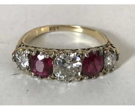 A fine 18ct gold ruby and diamond ring, the central stone approximately 1.1ct.