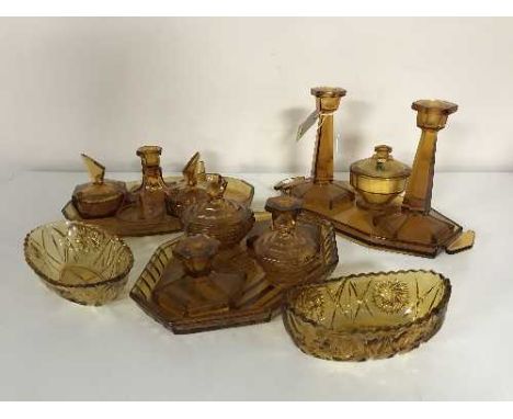 Three amber glass trinket sets and two bowls 