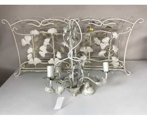 Two white metal mag racks and a three way light fitting 