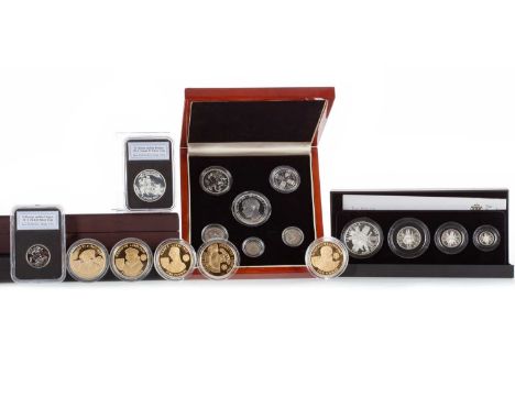 FOUR COIN SETS comprising Britannia 2011 four coin silver proof set, Edward VIII pattern set, Tudor collection five coin set 