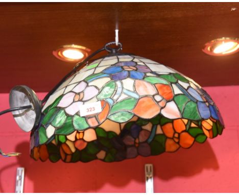 A large Tiffany style ceiling light with fittings