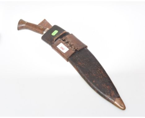 A mid 20th century khukuri, the blade engraved Qeycom Bros. 1944 in original leather scabbard, the scabbard with impressed ma