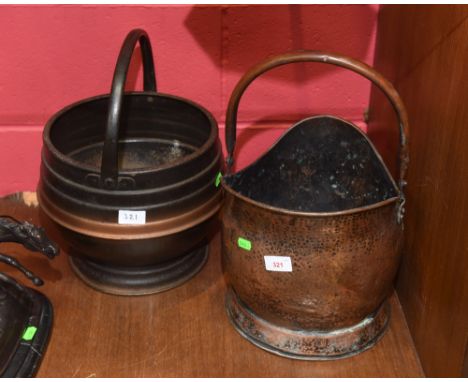 A helmet shaped hammered copper coal scuttle with swing handle together with a metal coal bucket (2)