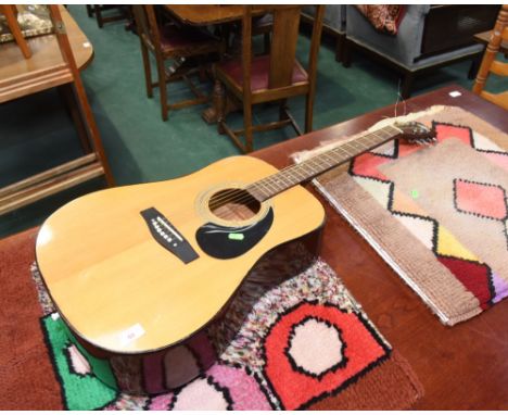 A tanglewood acoustic guitar