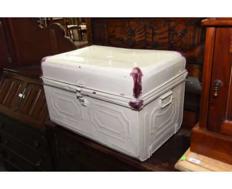 A painted tin trunk