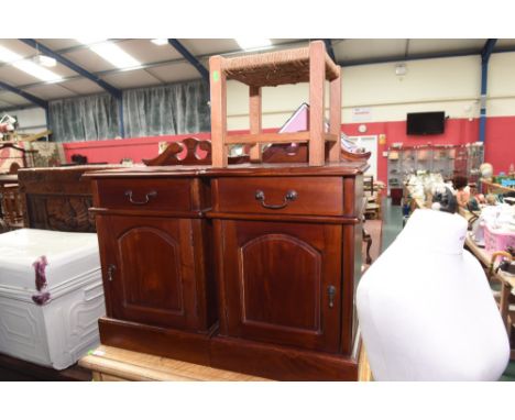 A pair of late 19th Century style mahogany bedside cabinets together with a rush seated stool (3)