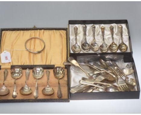 A silver bangle, Birmingham 1924 makers mark T.H. Ltd, together with two boxed sets of EPNS spoons and collection of plated f