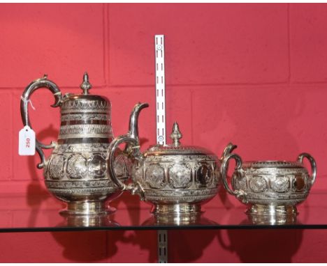 A three piece silver plate tea service, tea, coffee and sugar.