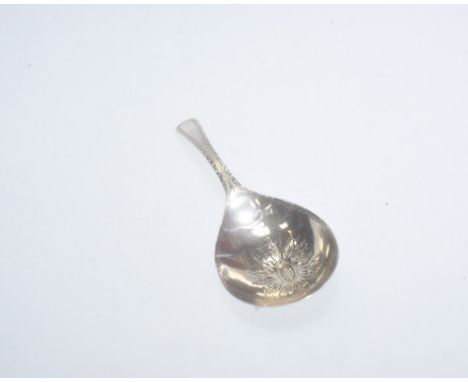 A George III silver caddy spoon, with engraved bowl and bright cut edged handle,  London 1789, 