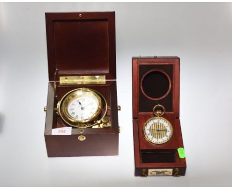 A reproduction cased chronometer; tog. with a Sewills reproduction pocket watch, both cased