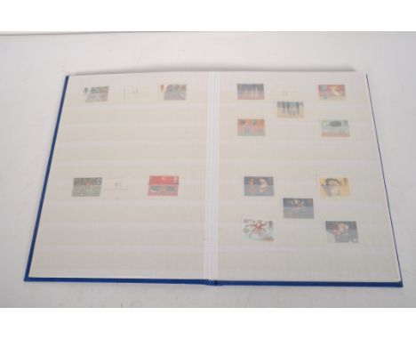 A collection of World stamps in seven albums and loose; and some first day covers