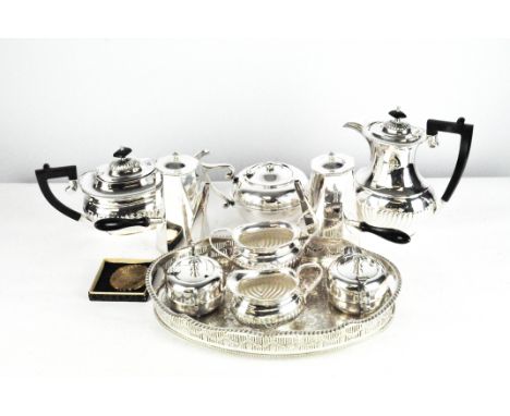 A quantity of silver plate, including a Yeoman four piece tea set, three piece tea set, cake knife, tray and other items