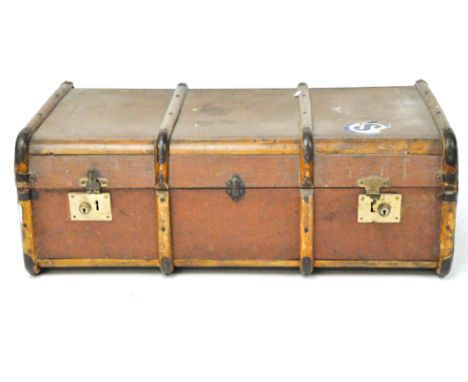 A vintage canvas and wooden bound travelling trunk, locks being stamped "British made", 93cm wide 