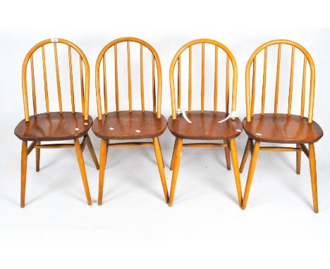 A set of four Ercol spindle back kitchen chairs in beech and elm, height 86cm 