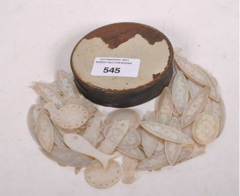 A collection of Chinese mother of pearl gaming counters, in various shapes (50 approx)
