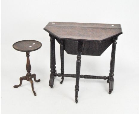 A 19th century drop leaf occasional table of octagonal form, on turned black stained supports and casters, 72cm x 77cm x 86cm