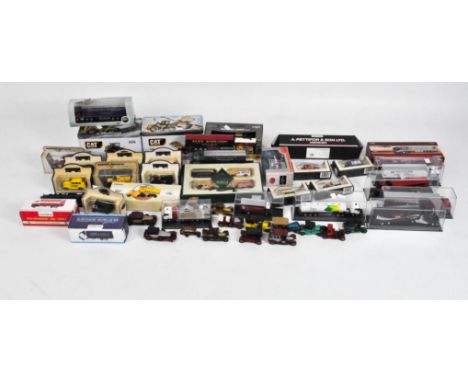 A large quantity of diecast vehicles, of assorted scales and makes including Lledo 'Day's Gone', Cat Diggers and ESE, most in