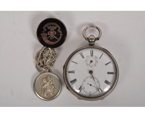 A gentleman's silver cased half hunter pocket watch, white enamel with Roman numerals and a subsidiary seconds dial, diameter