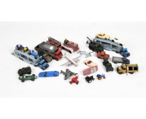 A group of play worn diecast toys, mostly Dinky, including a Heavy Tractor, a Ferrari, Fire Engine, and other models