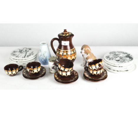 A Torquay coffee set in brown glaze, comprising a coffee jug and six cups and saucers, together with a set of novelty ceramic