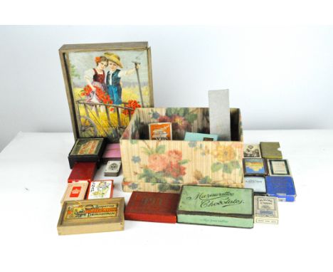 A collection of various vintage toys, comprising packs of cards, a Jacques' Word Making and Word Taking game, Players weights