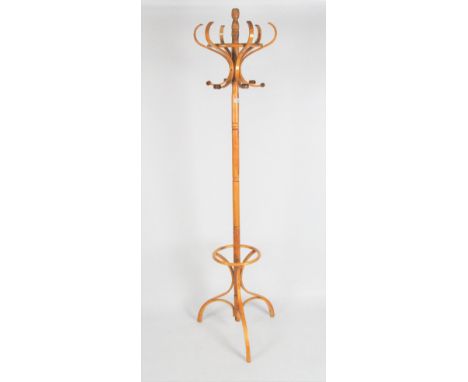 A contemporary pine coat stand, with six hooks and a tripod foot, height 180cm