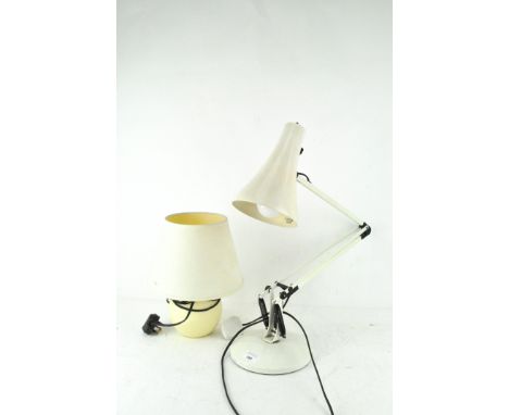 Two contemporary table lamps, including a white anglepoise lamp on circular base and a small cream example, total height 80cm