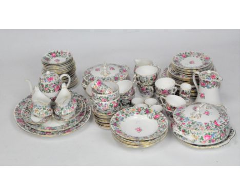 A Crown Staffordshire tea and dinner service, printed floral decoration with gilt rims, comprising tureens, gravy boats, cups