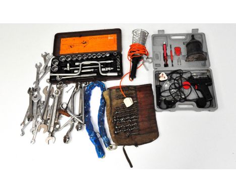 A collection of assorted vintage tools, including drill bits and a soldering gun 