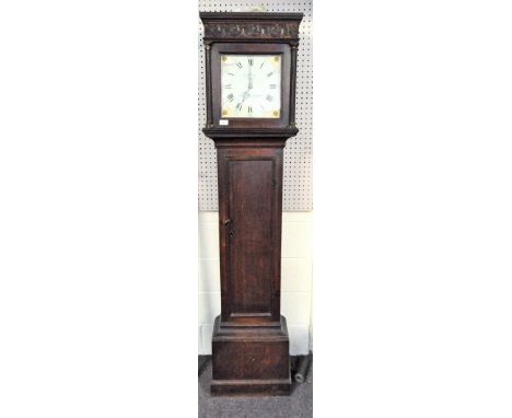 A late 18th/early 19th century long case clock with pendulum and weights, with carved case, enamel face inscribed Jn Lee High