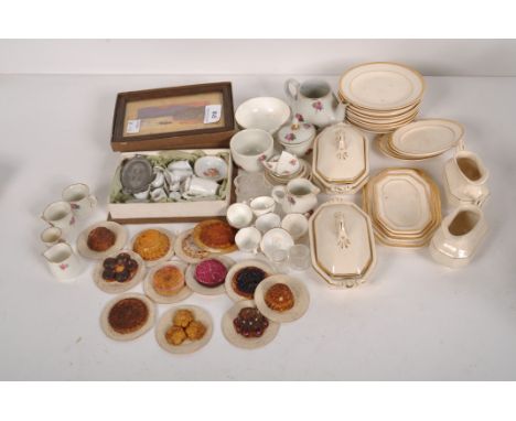 A collection of 19th &amp; 20th century dolls house food and tea services of assorted sizes, including papier mache food, gla