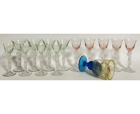 A mixed group of Art Deco coloured and frosted glass drinking glasses in the Lalique style with stems modellled as nude femal