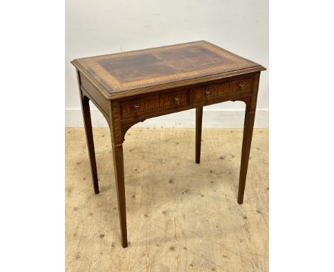 An Edwardian mahogany inlaid lamp table fitted two drawers with original brass knob handles on tapered supports (h. x&nbsp; 7