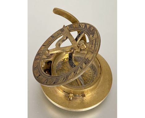 Scientific instruments, a brass nautical sundial and compass navigational compendium, marked J. Sewill Liverpool (w- 7cm)