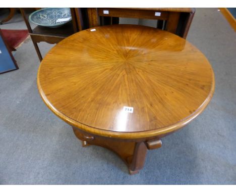 An Art Deco radial veneer, walnut and beech circular side table.