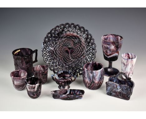A quantity of various Victorian purple malachite glassware, to include a basket posy holder; Sowerby boat posy trough; three 